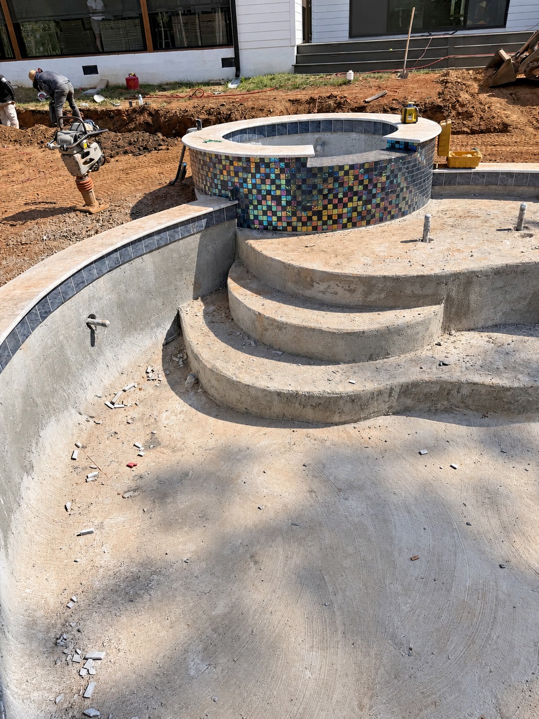 Raised spa tile and coping